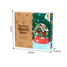 502PCS PANLOS 656012 Christmas Hut Spinning Music Box